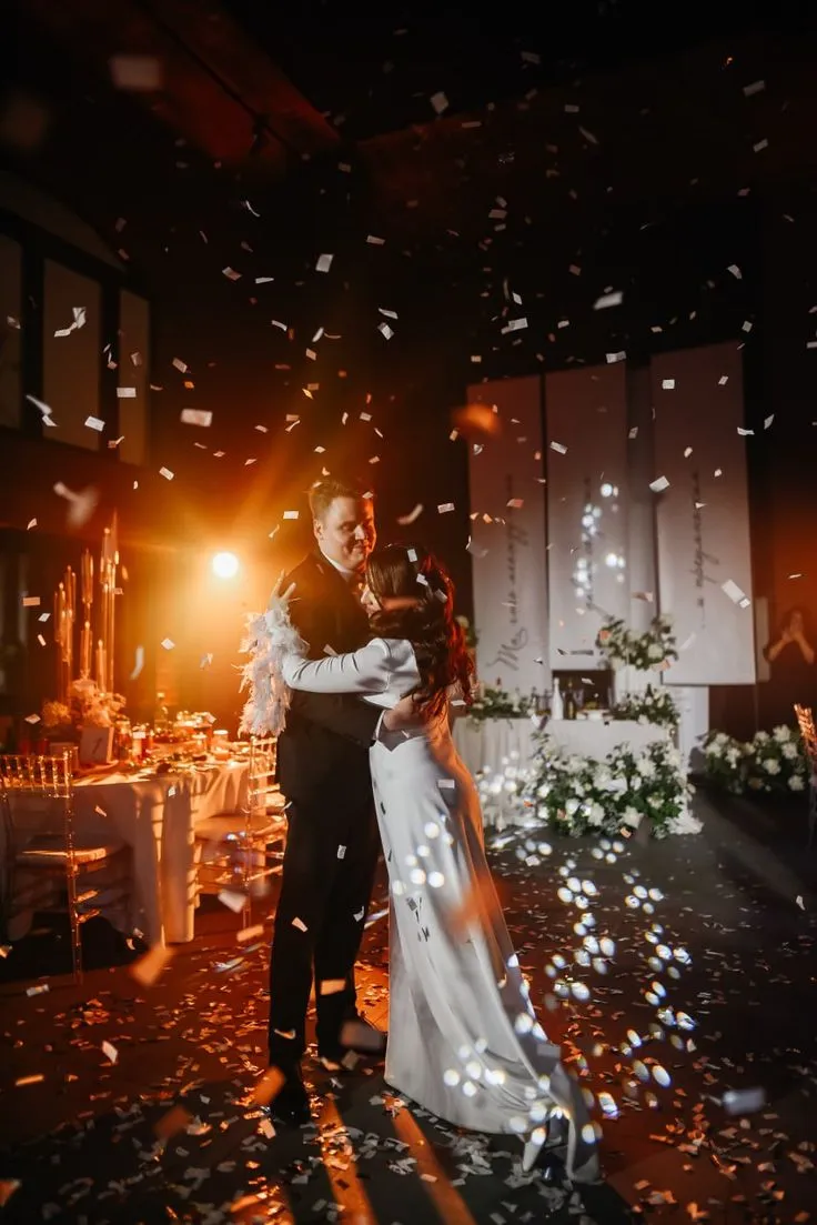 Elegant winter wedding with snowy backdrop and warm lighting